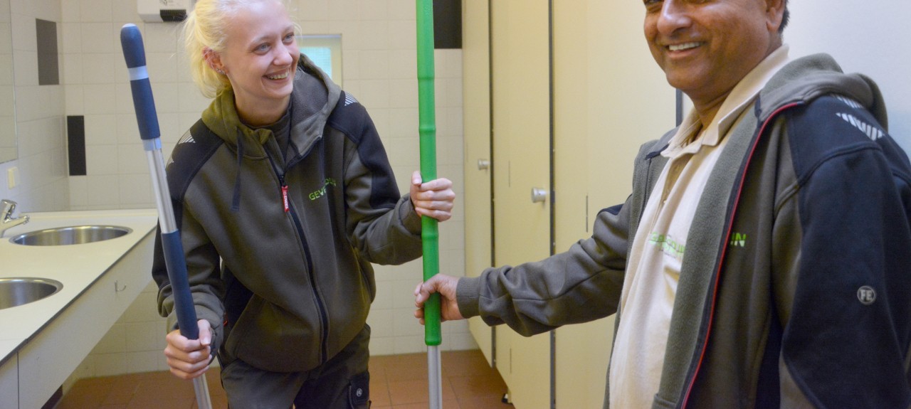 smiling while cleaning.jpg